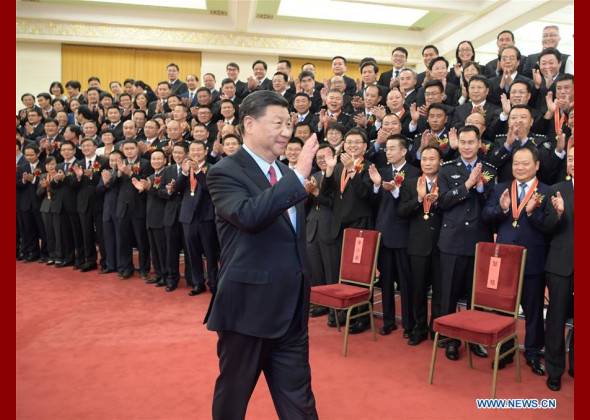 Xi Meets Model Civil Servants